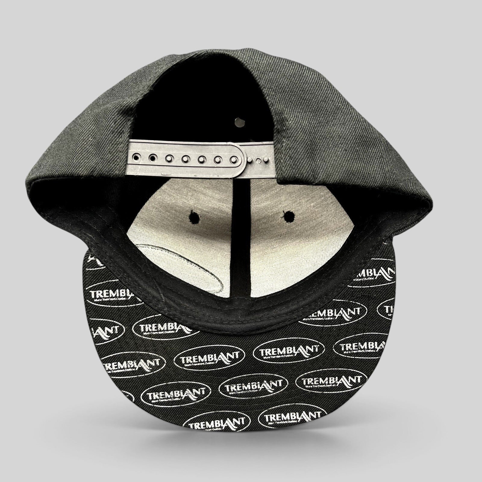 Raree Finds black snapback hat with Mont Tremblant logo print on the underbrim and adjustable snapback closure