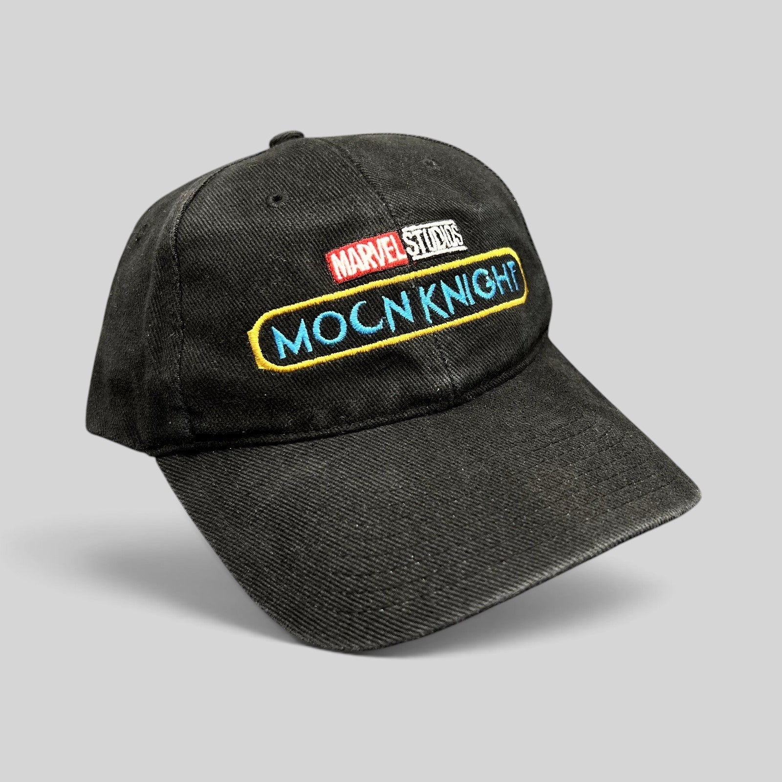 Raree Finds black cotton strapback hat featuring embroidered Marvel Studios and Moon Knight logos from the Disney+ series