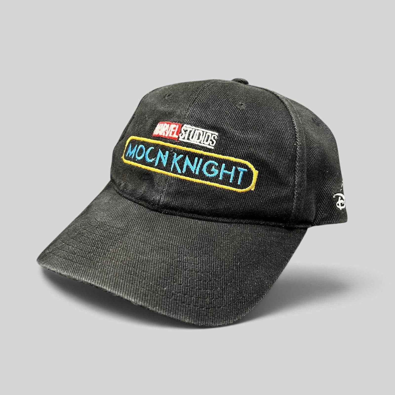 Raree Finds black cotton Moon Knight cast and crew strapback hat with embroidered Marvel Studios logo and Disney icon.