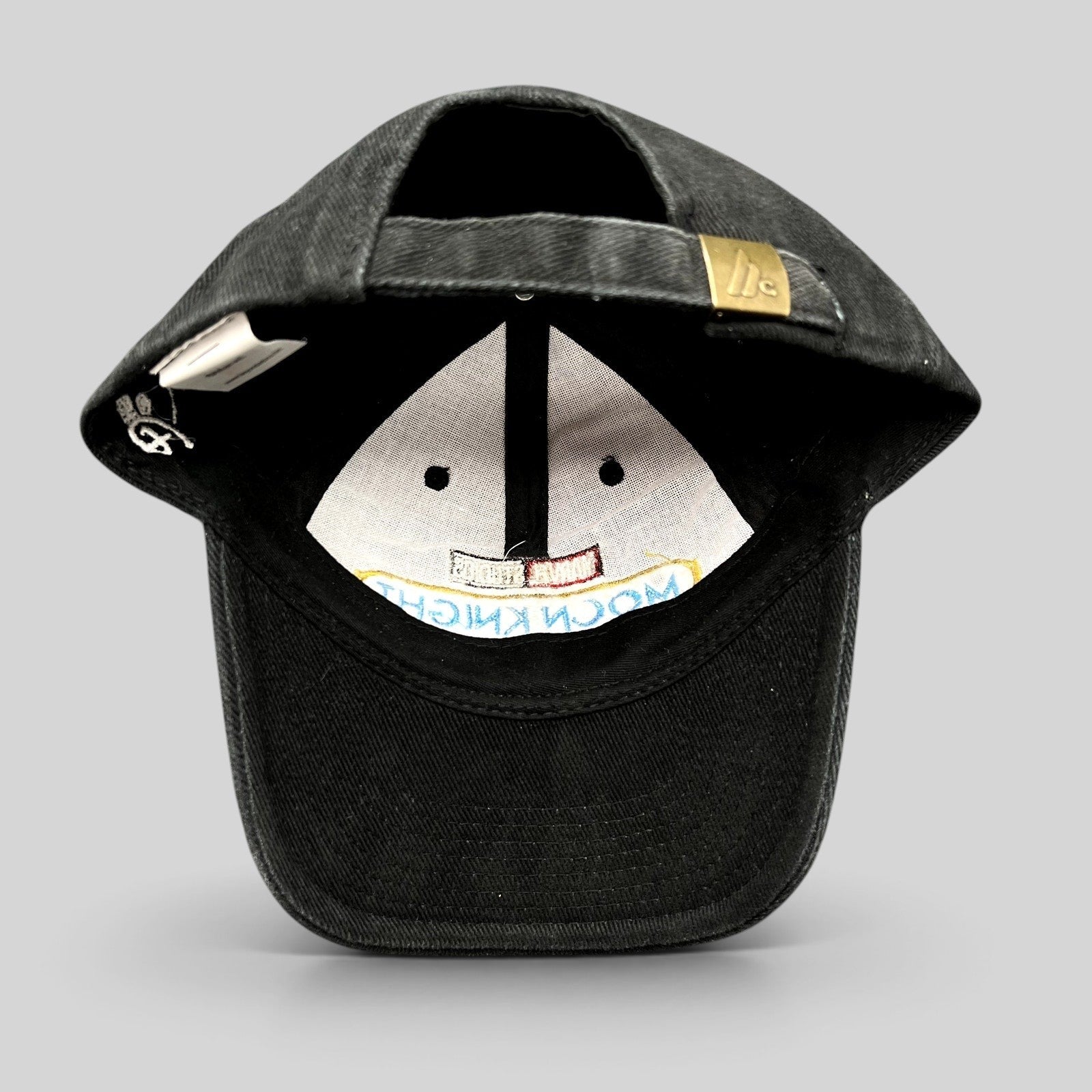 Raree Finds black cotton Moon Knight cast and crew strapback hat with metal slider buckle and interior production tag