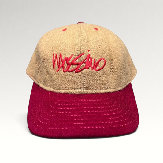Raree Finds vintage Mossimo wool snapback hat in camel and red with embroidered script logo, front view.