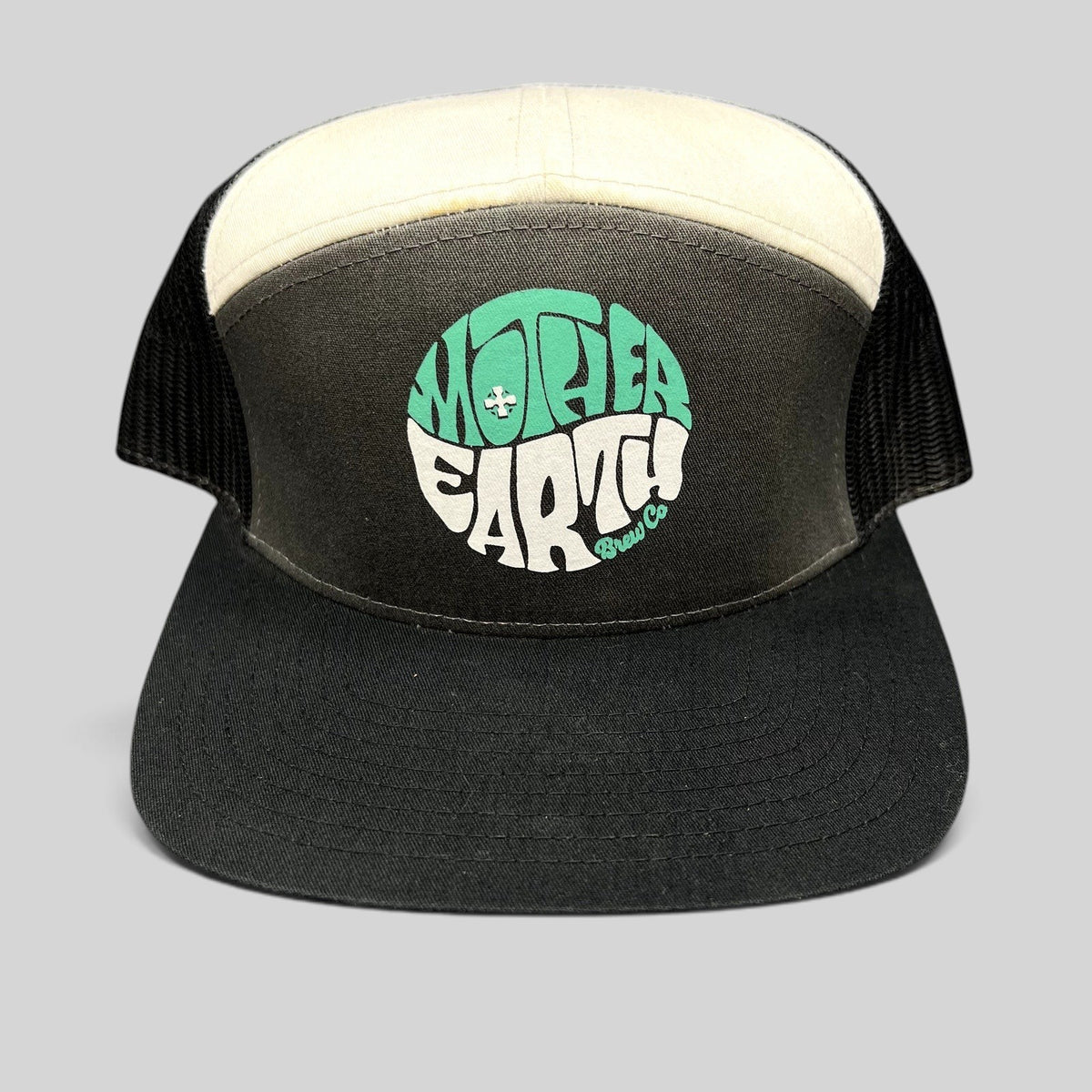 Raree Finds Mother Earth Brew Co Richardson trucker hat in black and cream with a teal and white circular logo