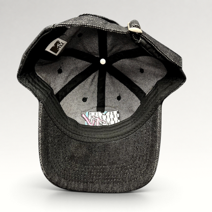 Raree Finds black MTV strapback hat interior showing six-panel construction, embroidered logo, and adjustable strap.