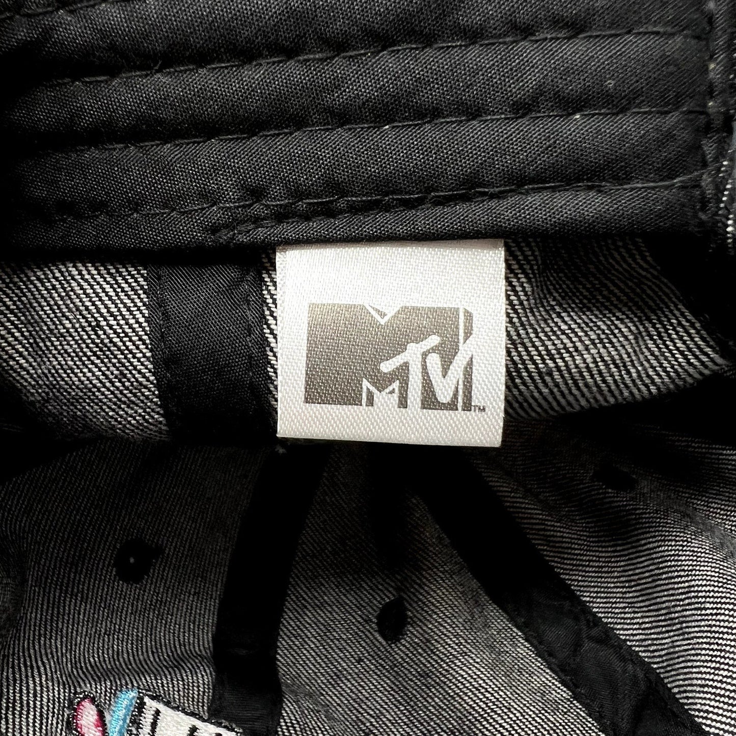 Raree Finds black MTV Music Television cap interior showing the official branded fabric tag and stitching