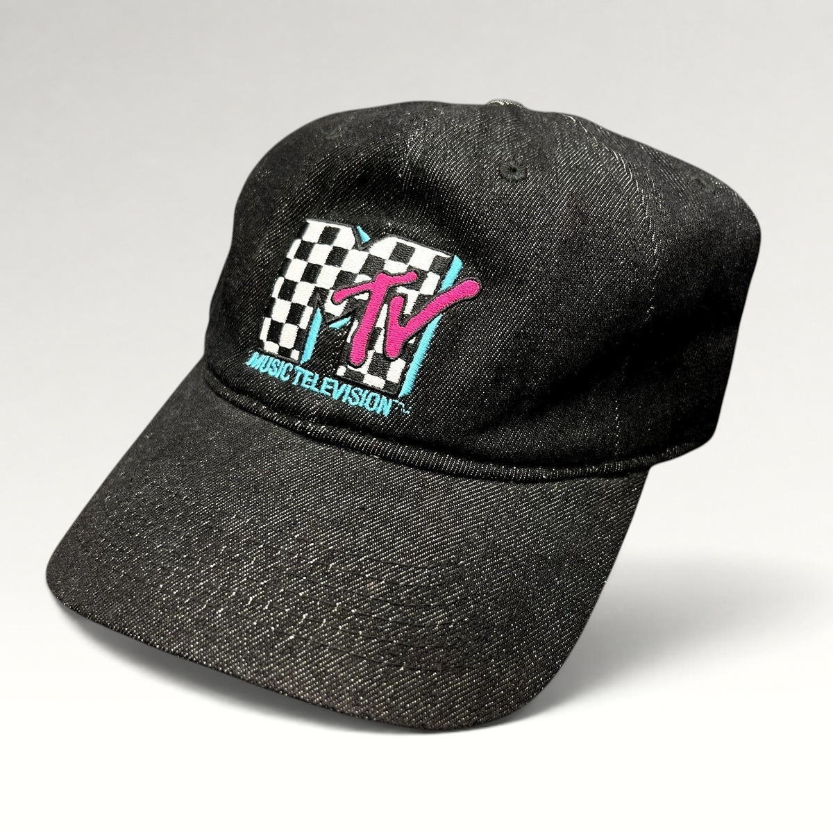 Raree Finds black MTV Music Television strapback hat with an embroidered checkered logo and teal and pink accents.