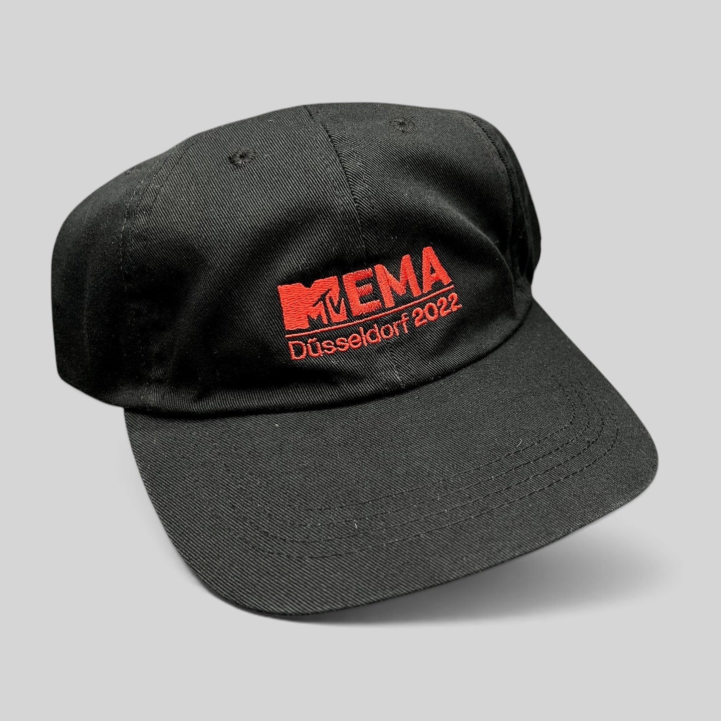 Raree Finds black six-panel strapback hat with red embroidered MTV EMA Düsseldorf 2022 logo on the front