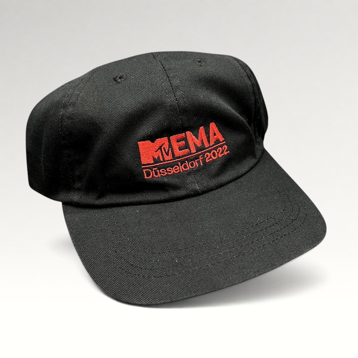 Raree Finds black six-panel strapback hat with red embroidered MTV EMA Düsseldorf 2022 logo on the front