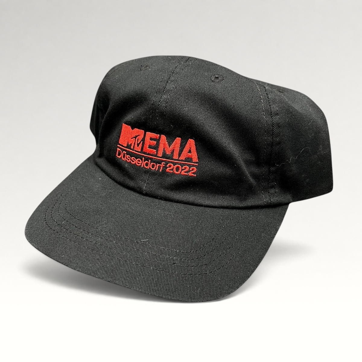 Raree Finds black six-panel strapback hat with red embroidered MTV EMA Düsseldorf 2022 logo on the front