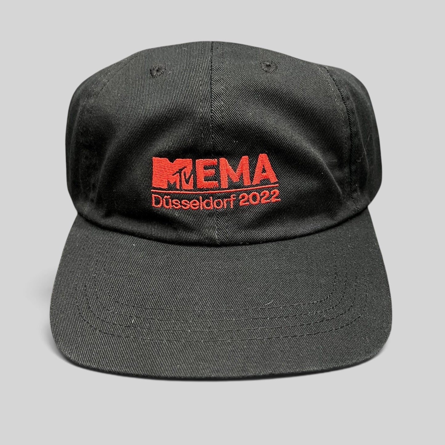 Raree Finds black Beechfield strapback hat with red embroidered MTV EMA Düsseldorf 2022 logo on the front panel.