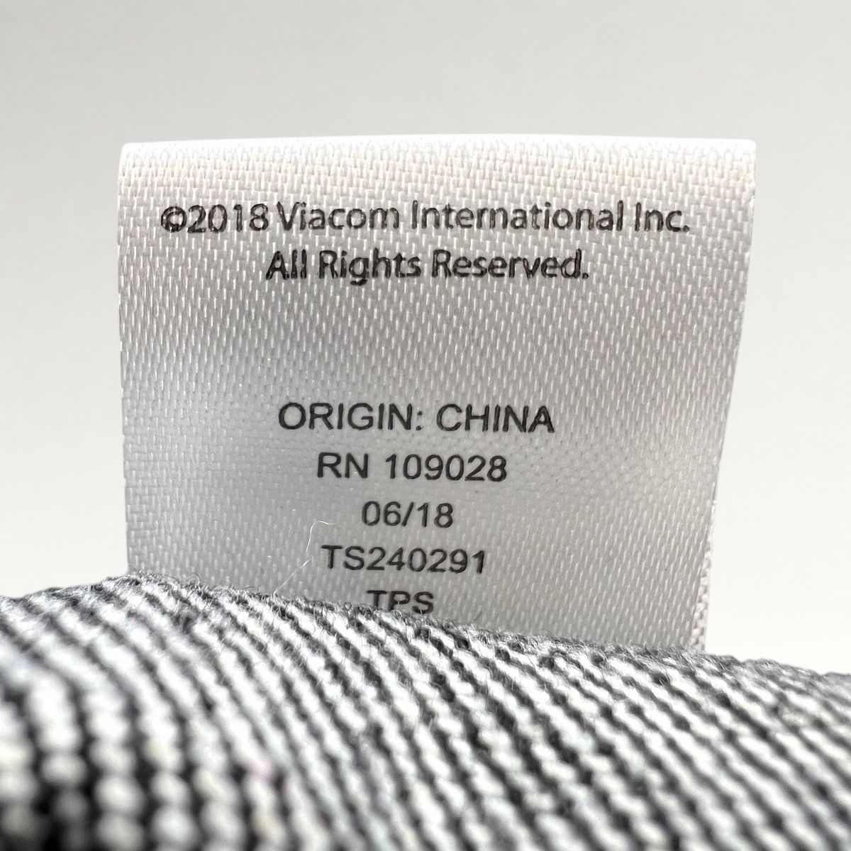 Raree Finds MTV hat white interior fabric care label with 2018 Viacom copyright and origin details