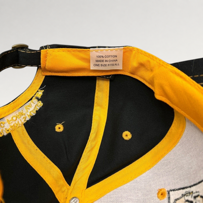 Raree Finds vintage NAPA Auto Parts cap interior showing yellow taped seams, cotton label, and metal strapback buckle