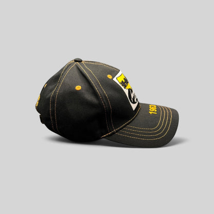 Raree Finds vintage NAPA Auto Parts strapback cap in black cotton with yellow embroidery and 1963 brim detail