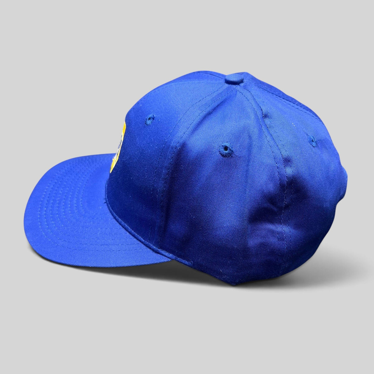 Raree Finds vintage royal blue NAPA Racing snapback hat with structured crown and embroidered yellow logo