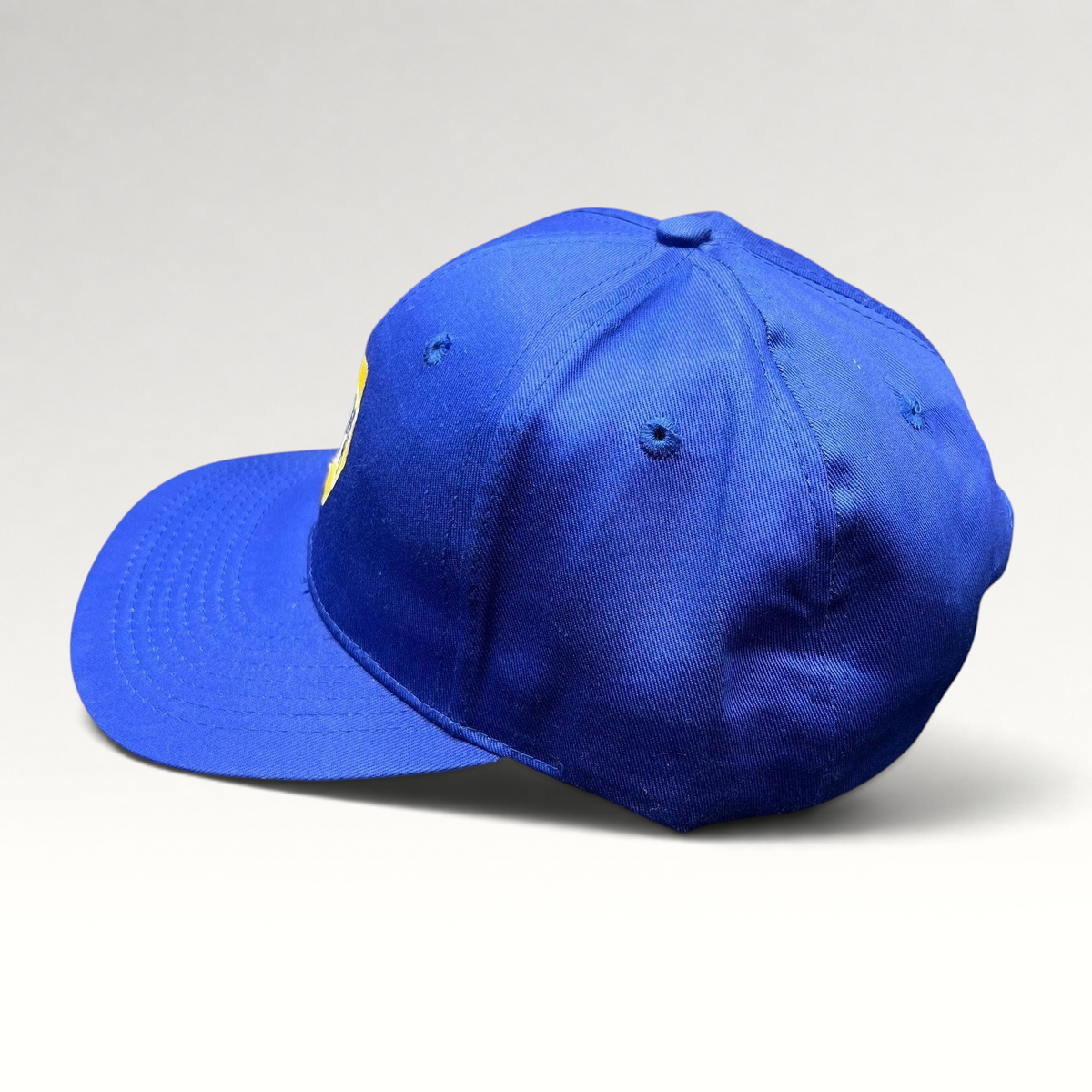 Raree Finds vintage royal blue NAPA Racing snapback hat with structured crown and embroidered yellow logo