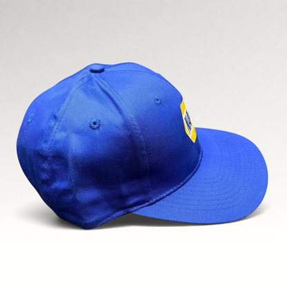 Raree Finds vintage royal blue NAPA Racing snapback hat with yellow embroidered logo on a structured 6-panel crown.