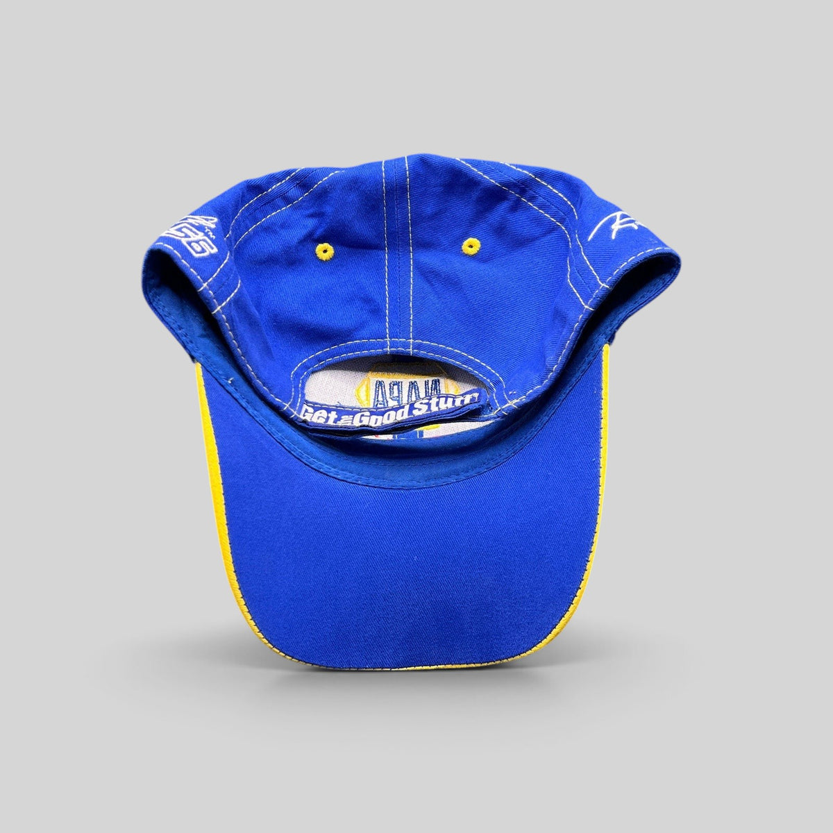 Raree Finds vintage royal blue NAPA Racing strapback hat with yellow underbrim and Ron Capps signature embroidery