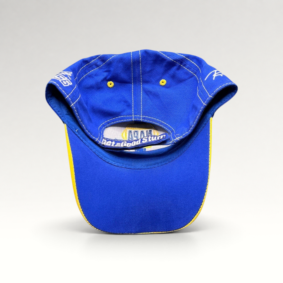 Raree Finds vintage royal blue NAPA Racing strapback hat with yellow underbrim and Ron Capps signature embroidery