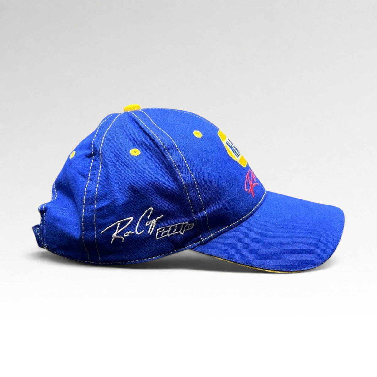 Raree Finds vintage royal blue NAPA Racing strapback hat with yellow accents and Ron Capps signature embroidery