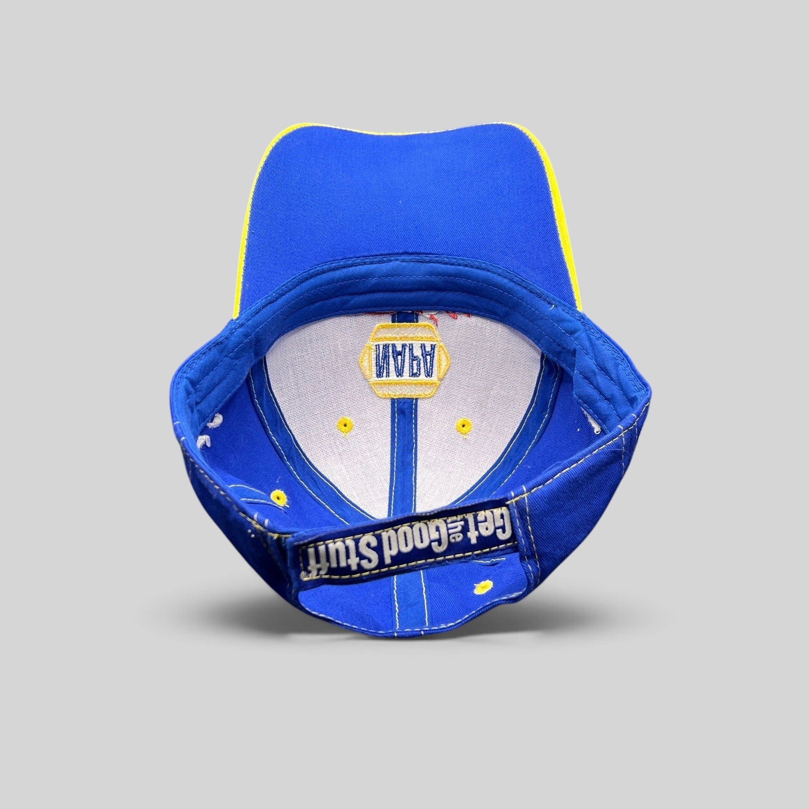 Raree Finds vintage NAPA Racing strapback hat in royal blue cotton, showing the interior crown and adjustable strap.