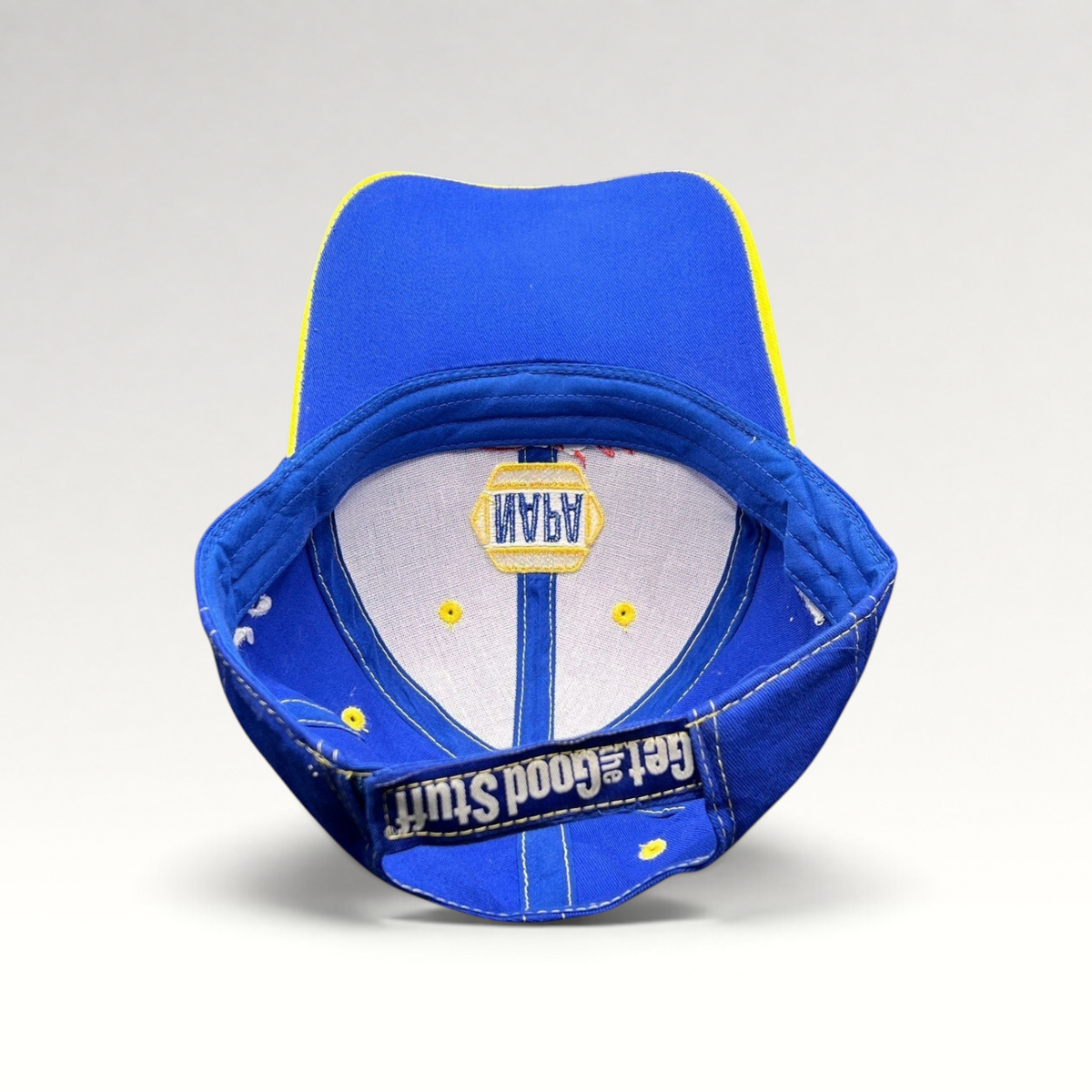 Raree Finds vintage NAPA Racing strapback hat in royal blue cotton, showing the interior crown and adjustable strap.