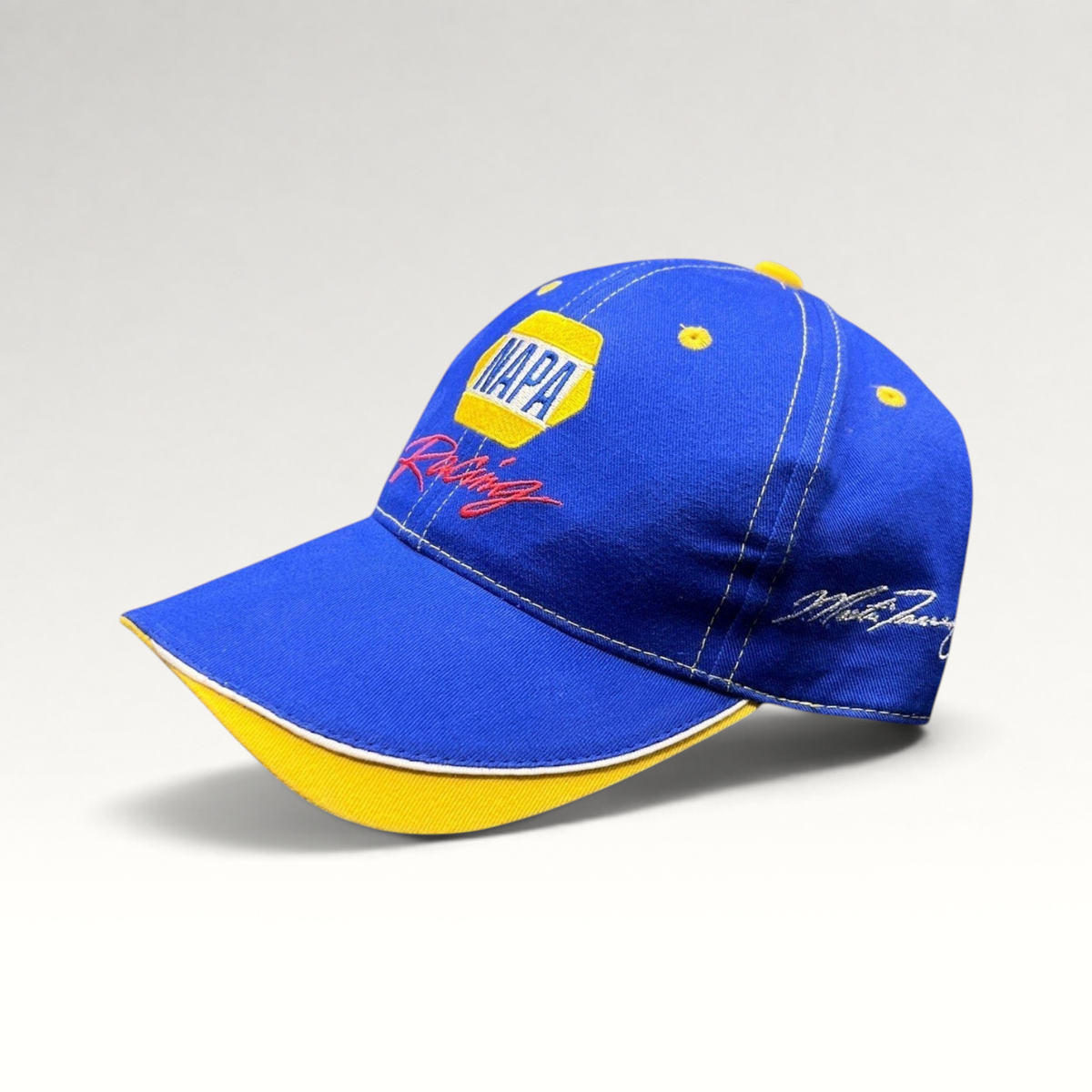 Raree Finds vintage royal blue NAPA Racing strapback hat with yellow accents and Ron Capps signature embroidery.