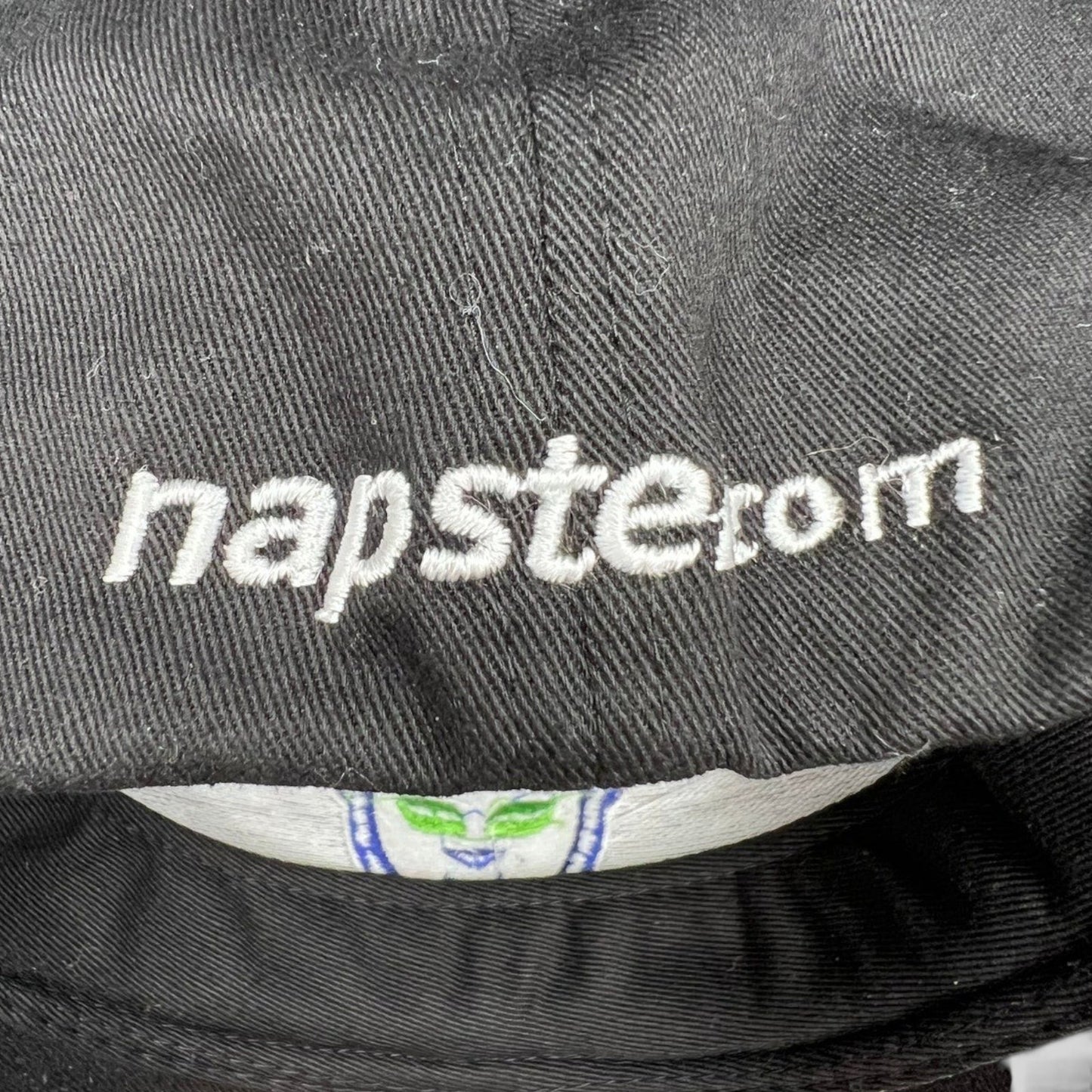 Raree Finds vintage Y2K black flex hat with white Napster.com embroidery on the back panel