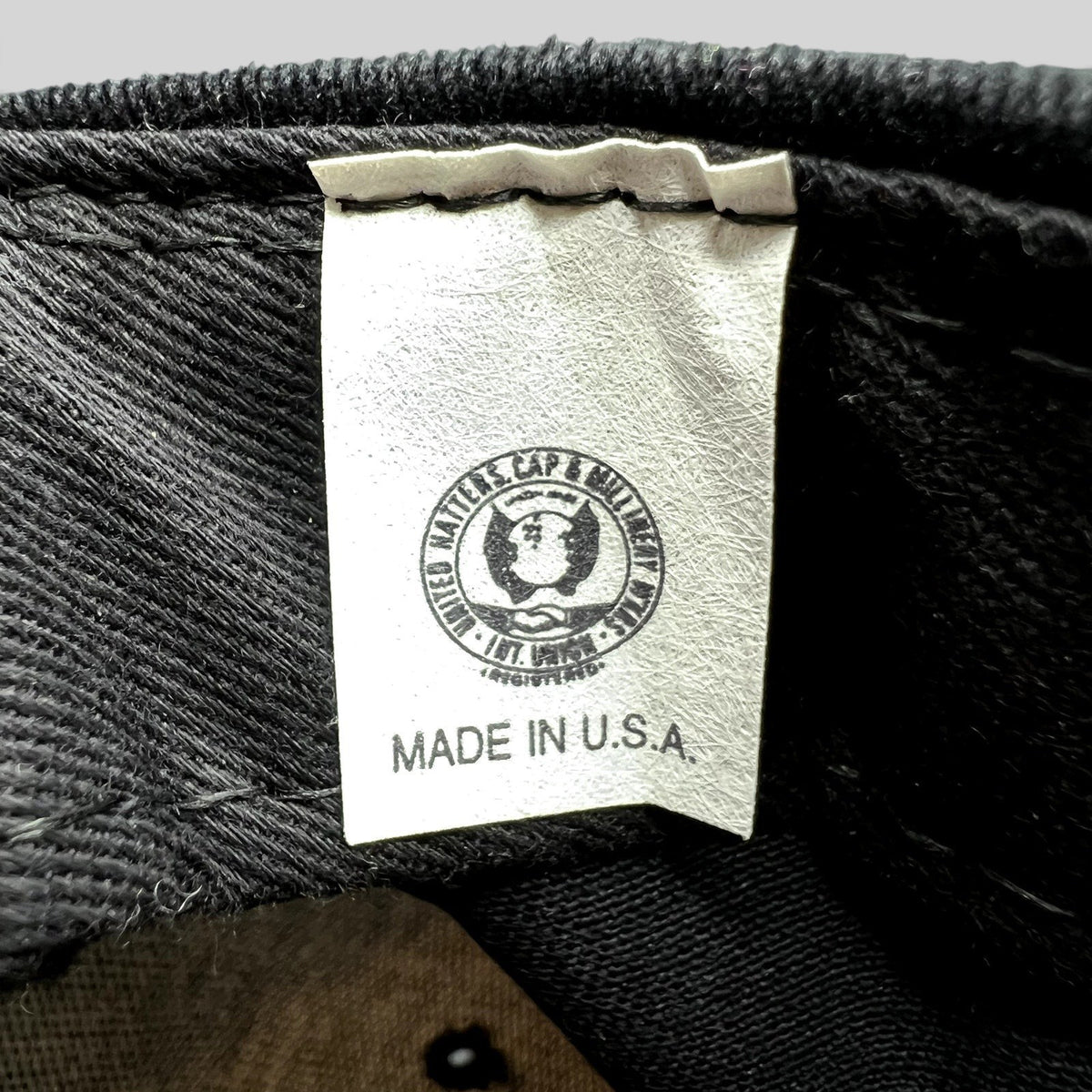 Raree Finds vintage American Needle NASA hat interior tag showing Made in U.S.A. and union label details.