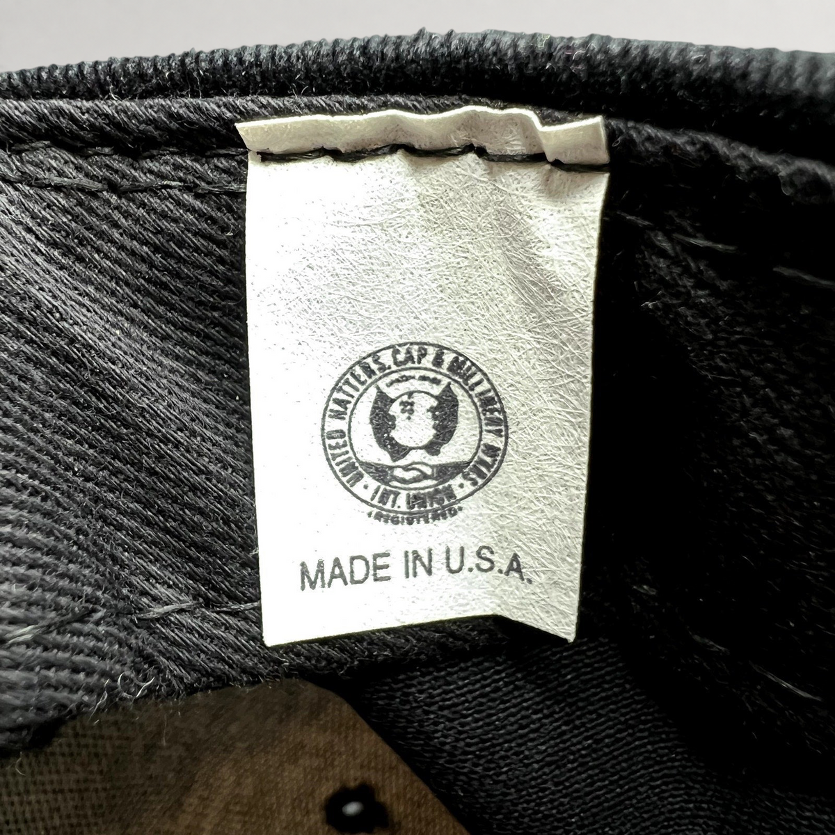 Raree Finds vintage American Needle NASA hat interior tag showing Made in U.S.A. and union label details.