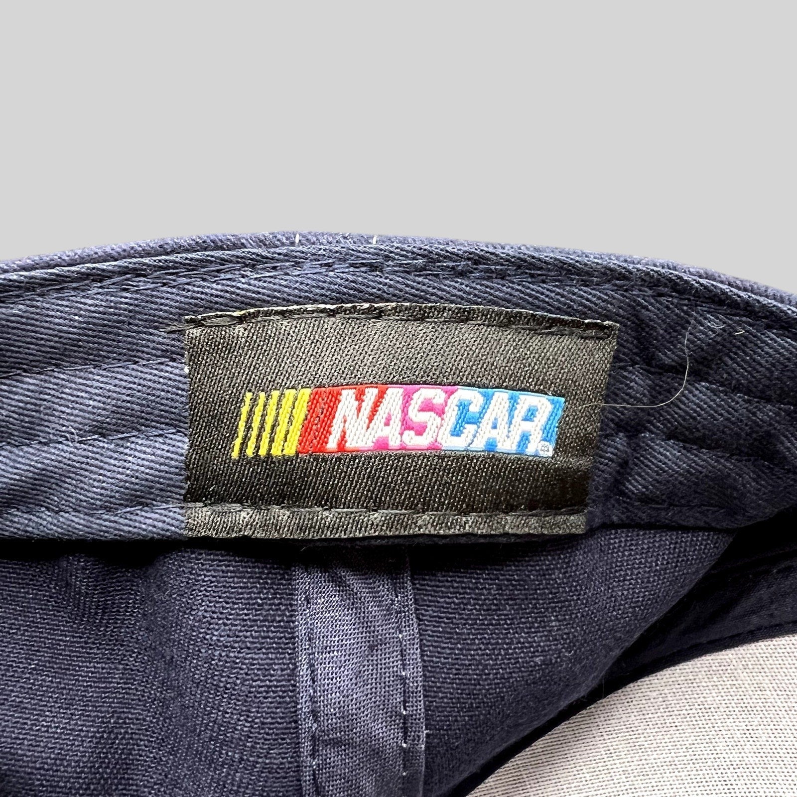Raree Finds official NASCAR logo woven label stitched inside a navy blue Dale Earnhardt Jr. adjustable hat