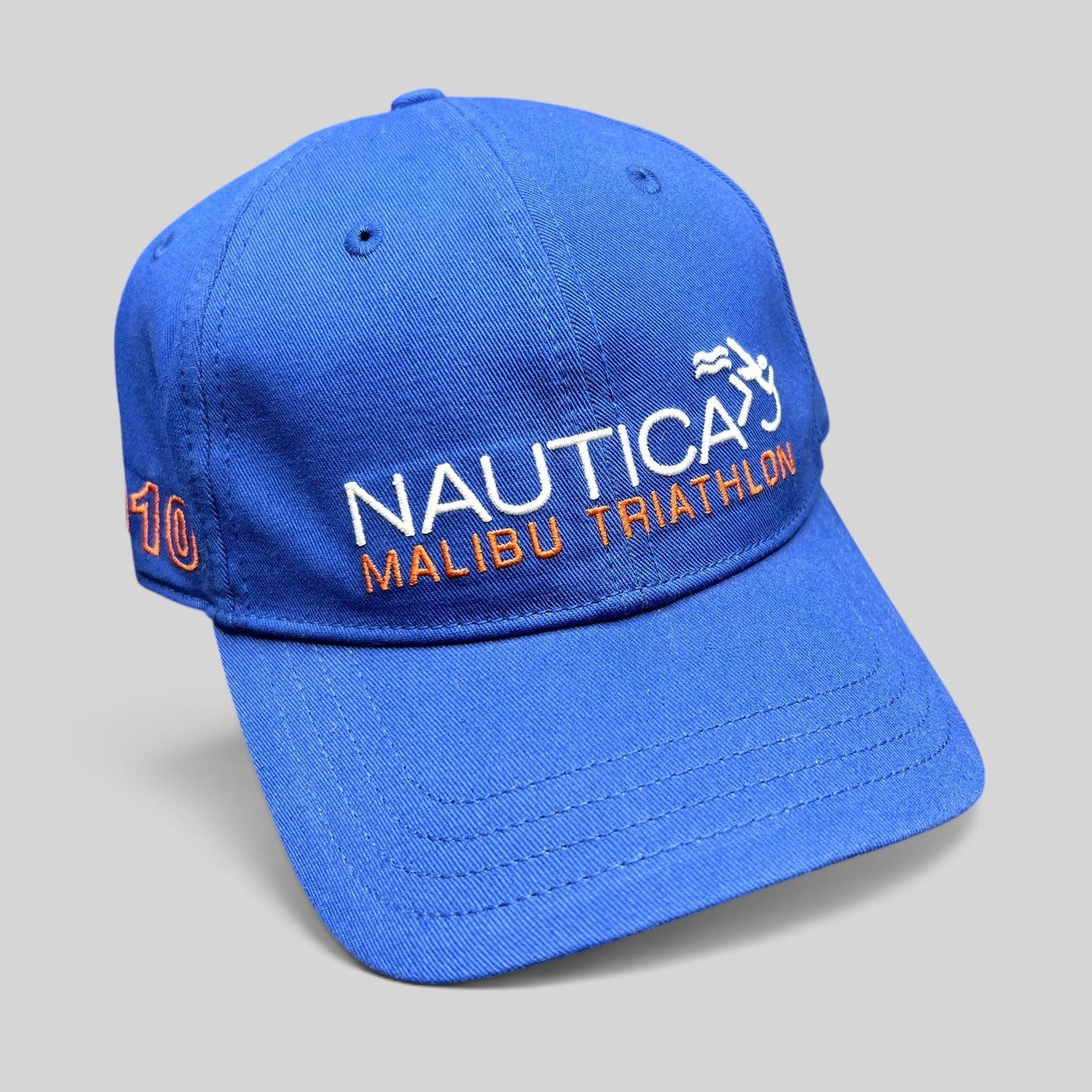 Raree Finds blue cotton Nautica Malibu Triathlon strapback hat with embroidered front and side event logos