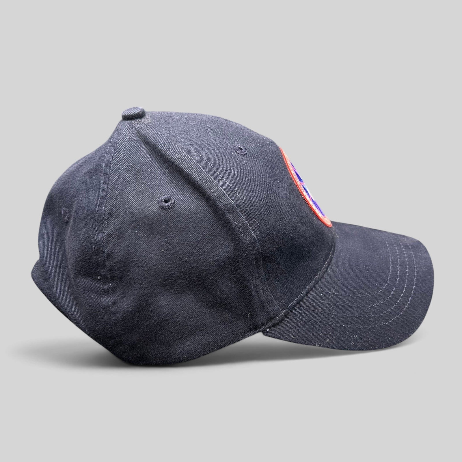 Raree Finds navy blue cotton strapback hat with US Antarctic Program NSF patch, side profile view.