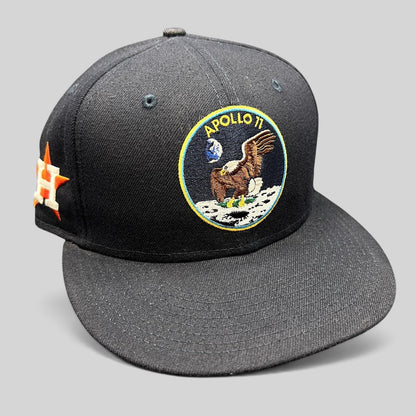 Raree Finds navy blue New Era 59FIFTY fitted hat featuring an embroidered Apollo 11 mission patch on the front.