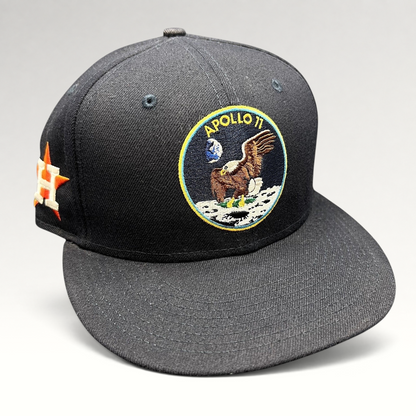 Raree Finds navy blue New Era 59FIFTY fitted hat featuring an embroidered Apollo 11 mission patch on the front.