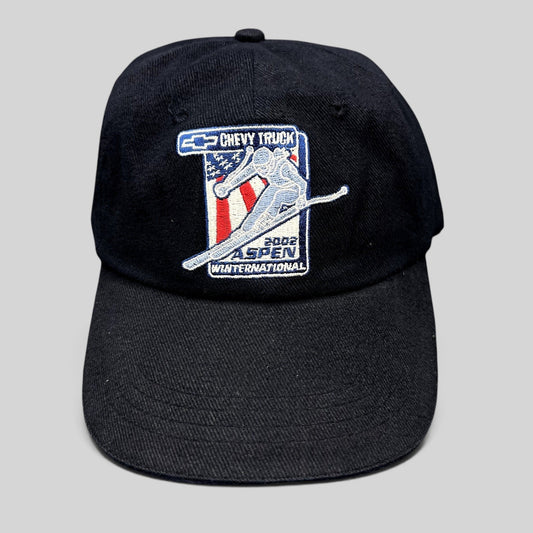 Raree Finds navy blue 2002 Aspen Winternational cotton strapback hat with embroidered Chevy Truck and skier graphic