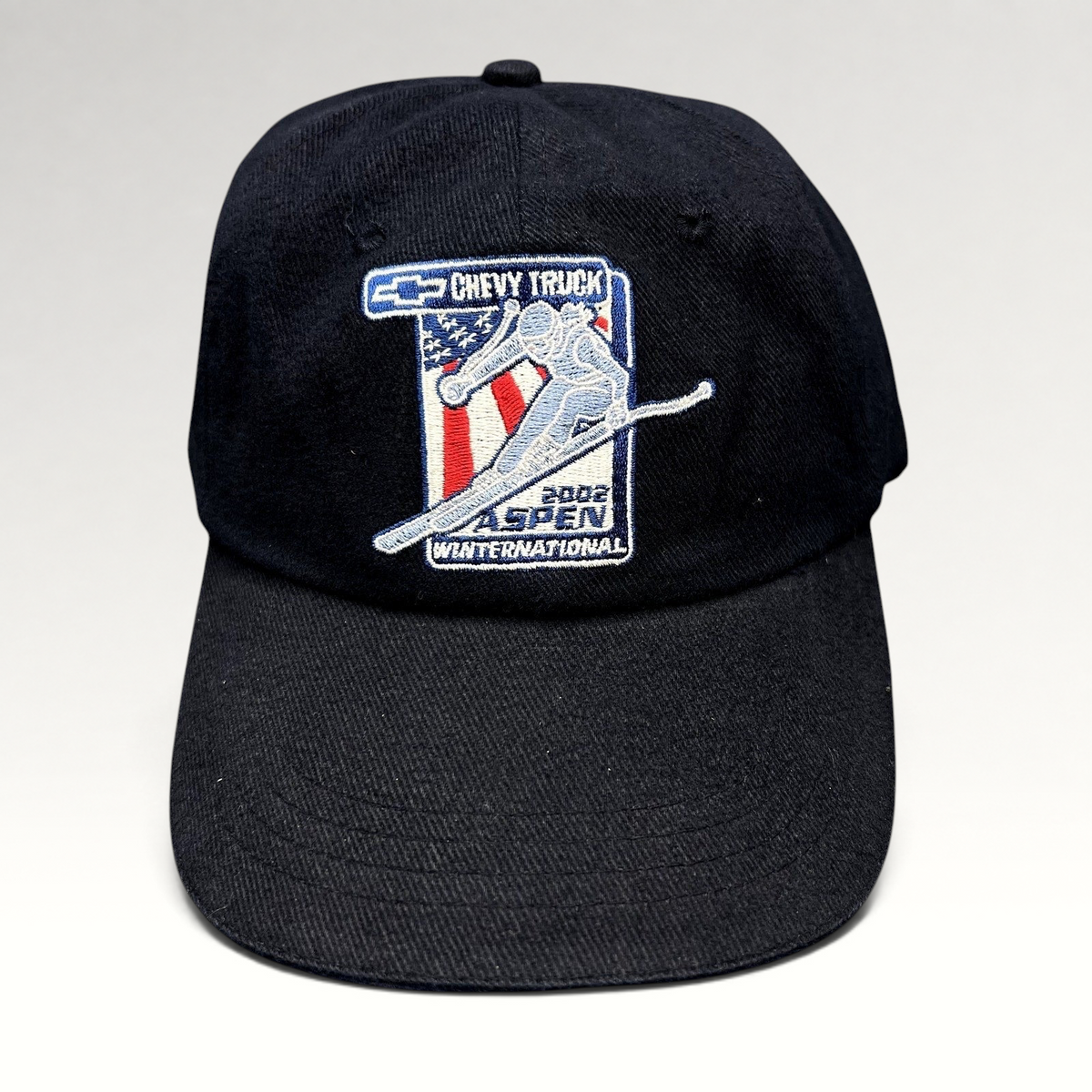 Raree Finds navy blue 2002 Aspen Winternational cotton strapback hat with embroidered Chevy Truck and skier graphic