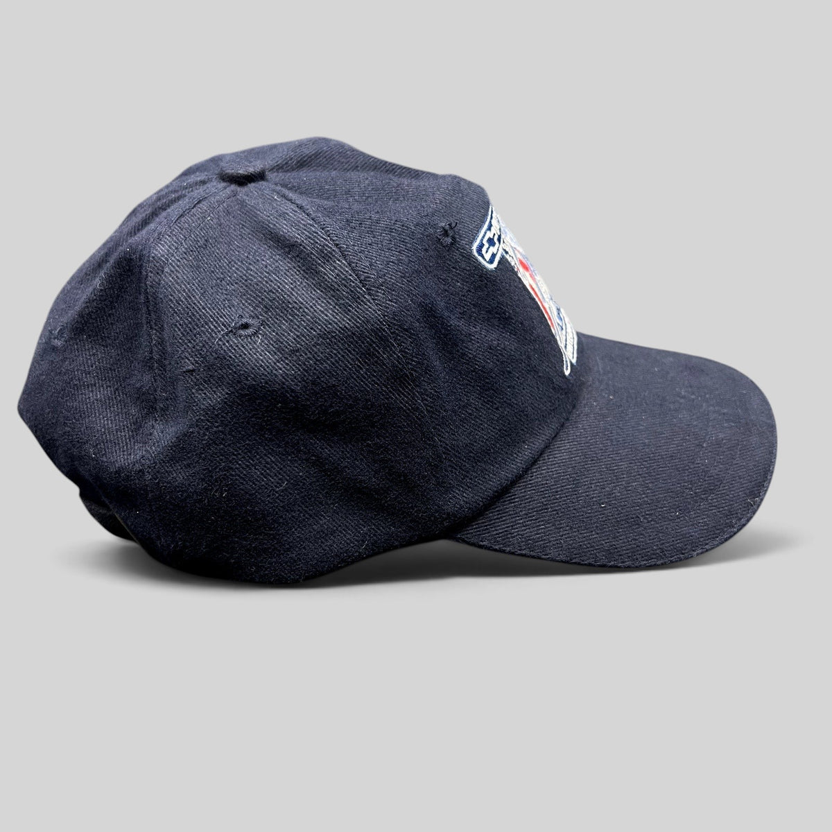 Raree Finds navy blue 2002 Aspen Winternational cotton strapback hat with embroidered Chevrolet and skier graphics