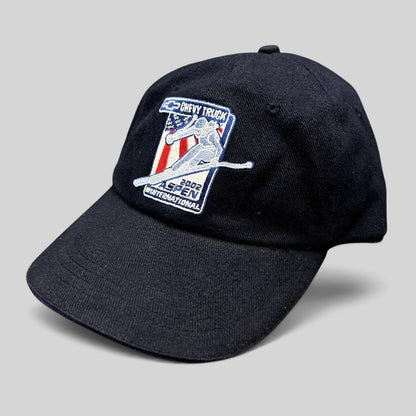 Raree Finds navy blue 2002 Aspen Winternational cotton strapback hat with Chevy Truck and alpine skier embroidery.