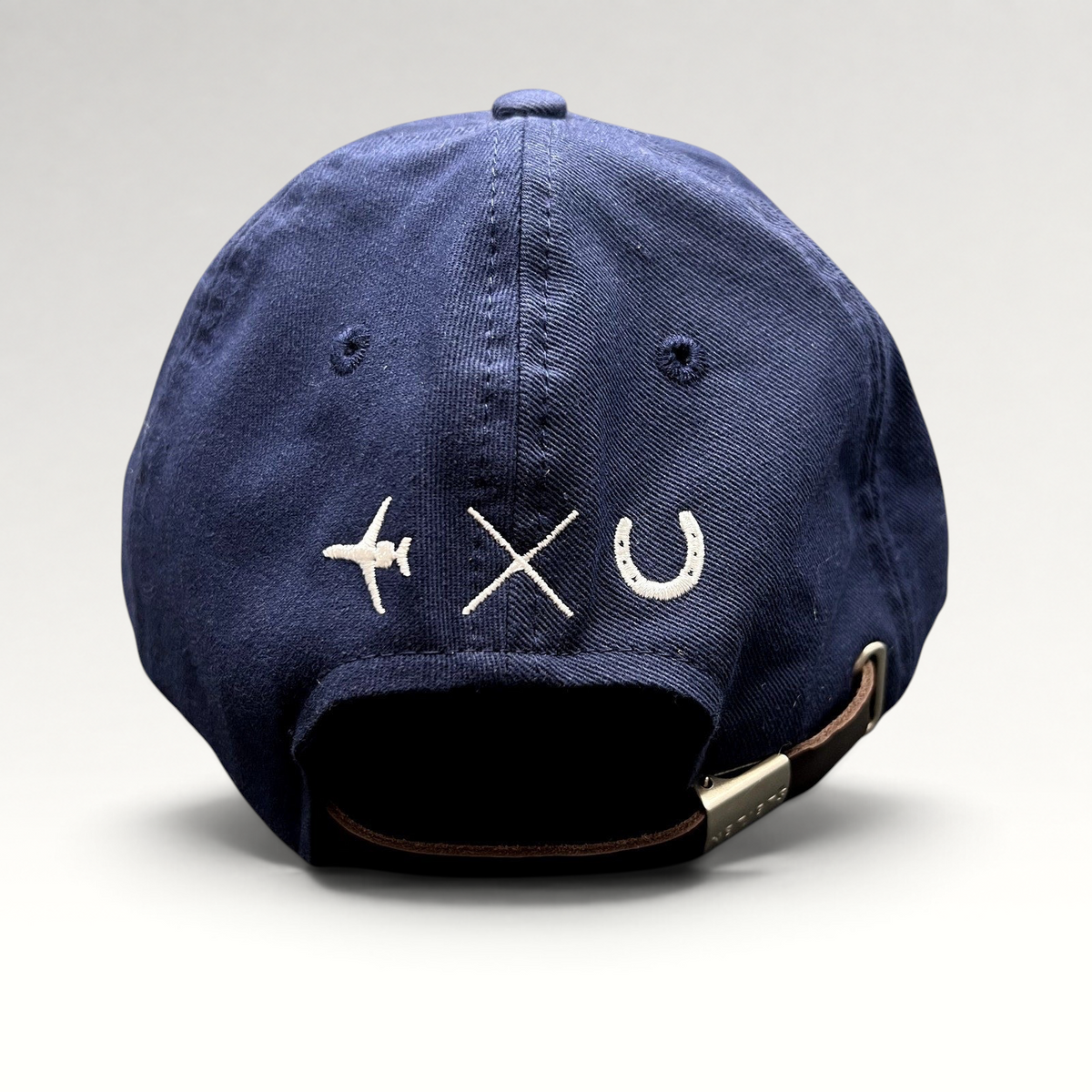 Raree Finds navy blue cotton strapback hat with aviation embroidery on back and genuine leather adjustable strap