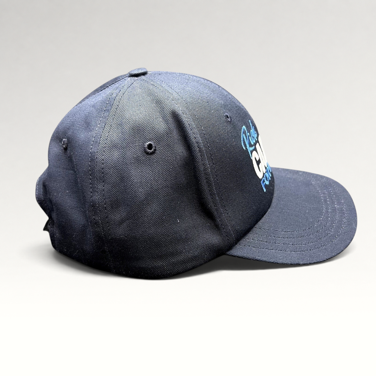 Raree Finds navy blue cotton strapback hat with Rick Caruso for Mayor embroidery, made in USA by Unionwear.