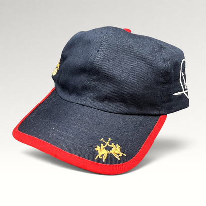 Raree Finds vintage navy blue cotton La Martina polo hat with red brim piping and gold embroidered rider logo