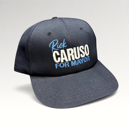 Raree Finds navy blue Rick Caruso for Mayor campaign strapback hat with embroidered text and adjustable closure.