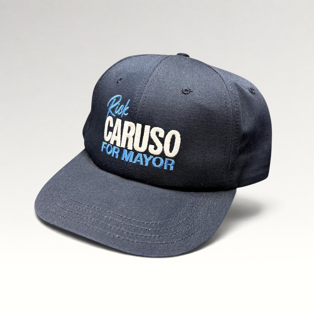 Raree Finds navy blue Rick Caruso for Mayor campaign strapback hat with embroidered text and adjustable closure