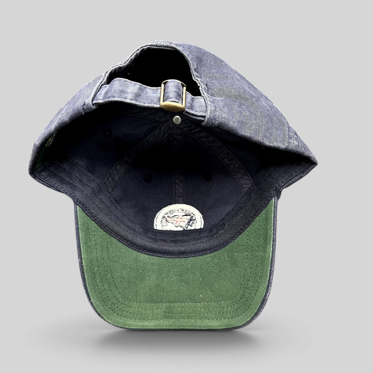 Raree Finds vintage navy blue Rolex Newport Bermuda Race Week 2012 sailing cap with green undervisor and strapback