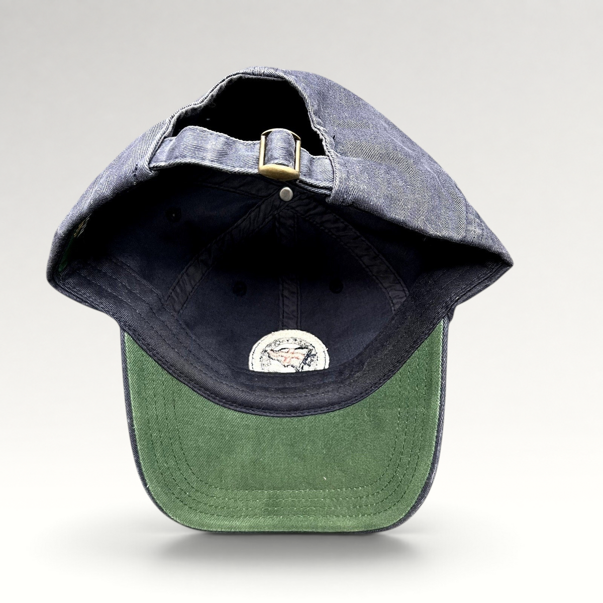 Raree Finds vintage navy blue Rolex Newport Bermuda Race Week 2012 sailing cap with green undervisor and strapback