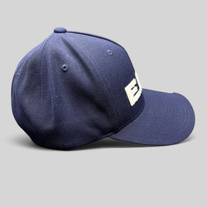 Raree Finds navy blue Yupoong Classics snapback hat with white felt E.N.D. lettering on a structured crown