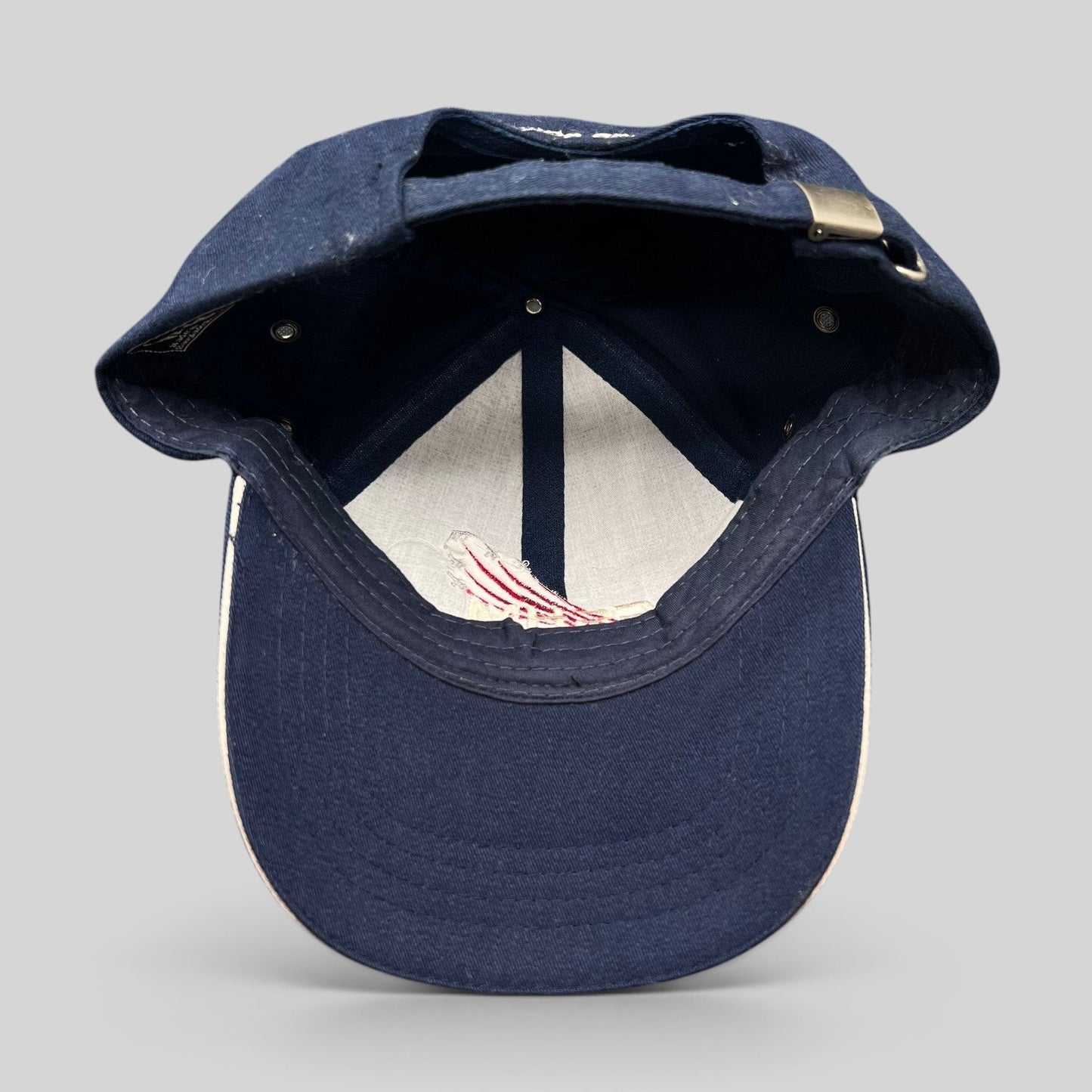Raree Finds vintage navy blue cotton Northrop Grumman ESHM SAFE Team strapback hat, back view showing adjustable strap