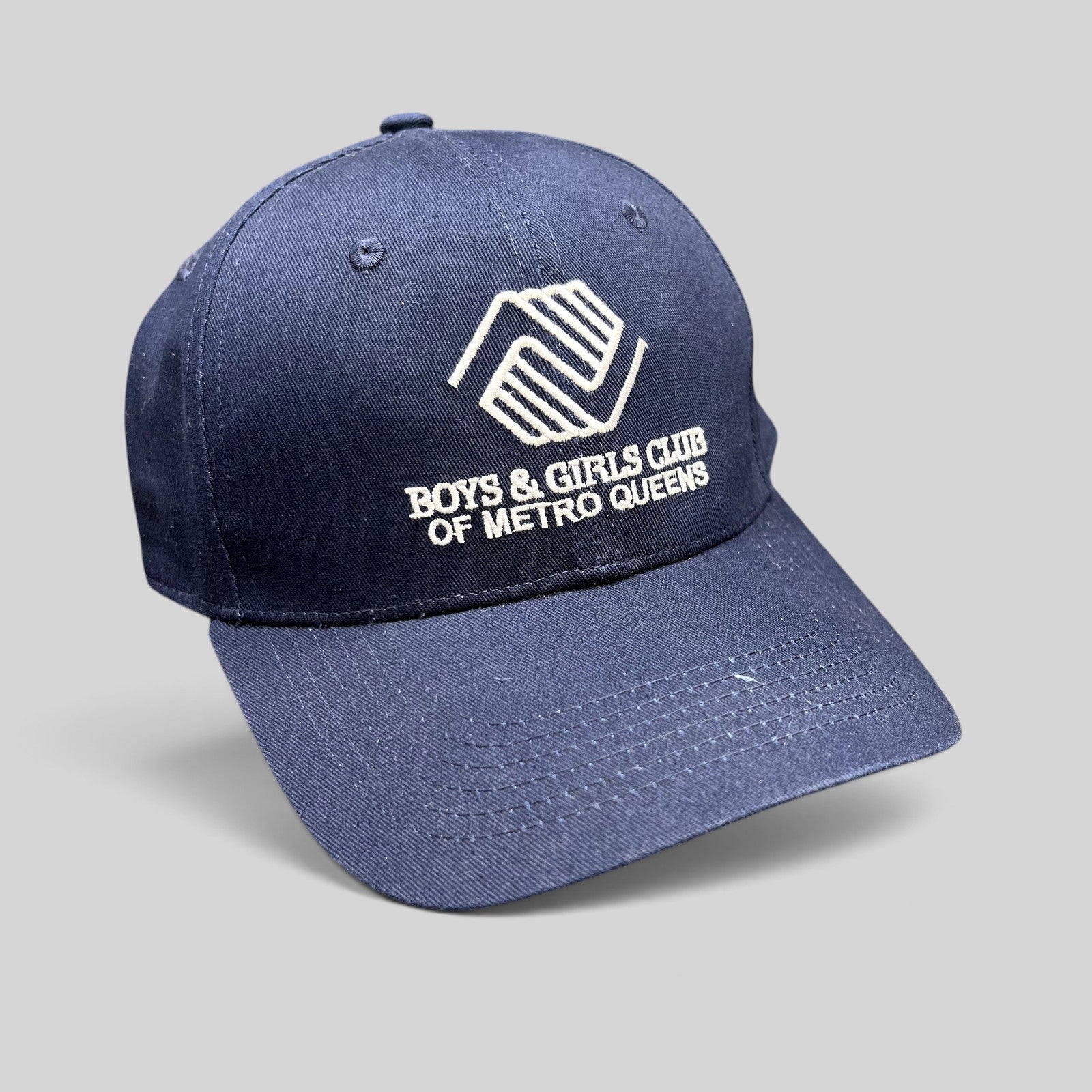 Raree Finds navy blue Boys & Girls Club of Metro Queens strapback hat with white embroidered logo and curved brim