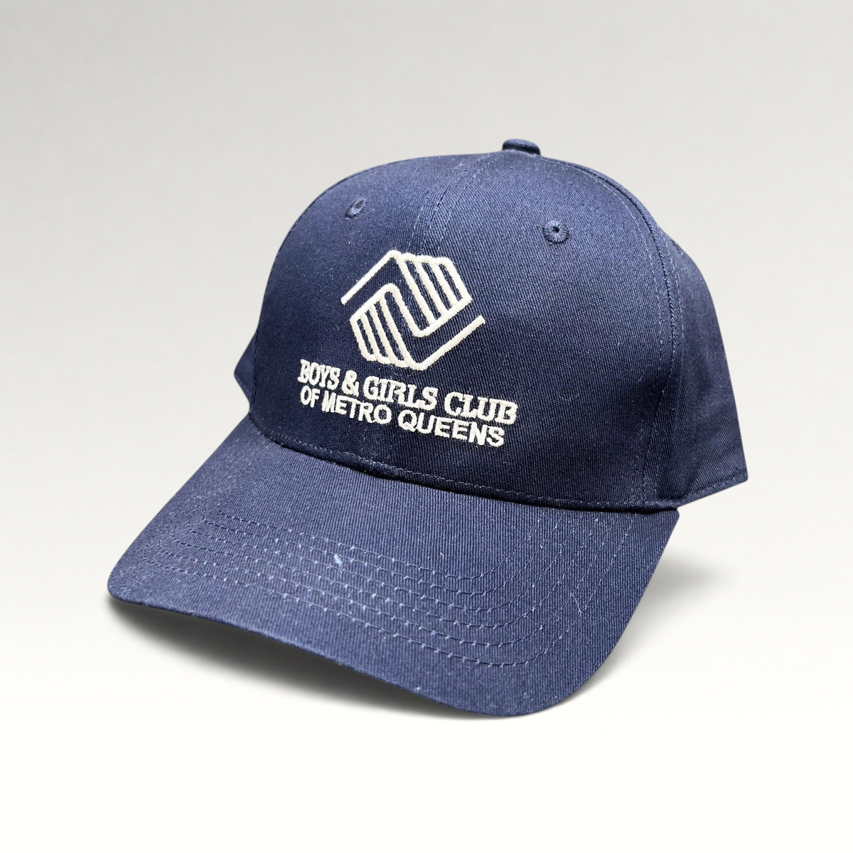 Raree Finds navy blue Boys & Girls Club of Metro Queens strapback hat with white embroidered logo and curved brim