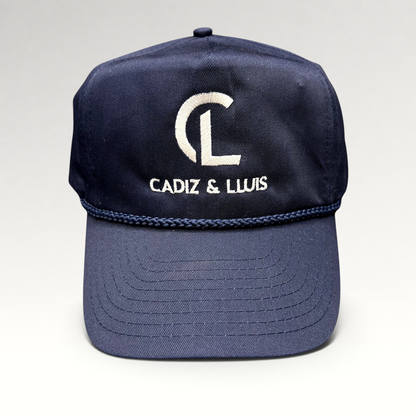 Raree Finds navy blue Cadiz & Lluis promotional snapback hat with white embroidered logo and braided rope bill detail