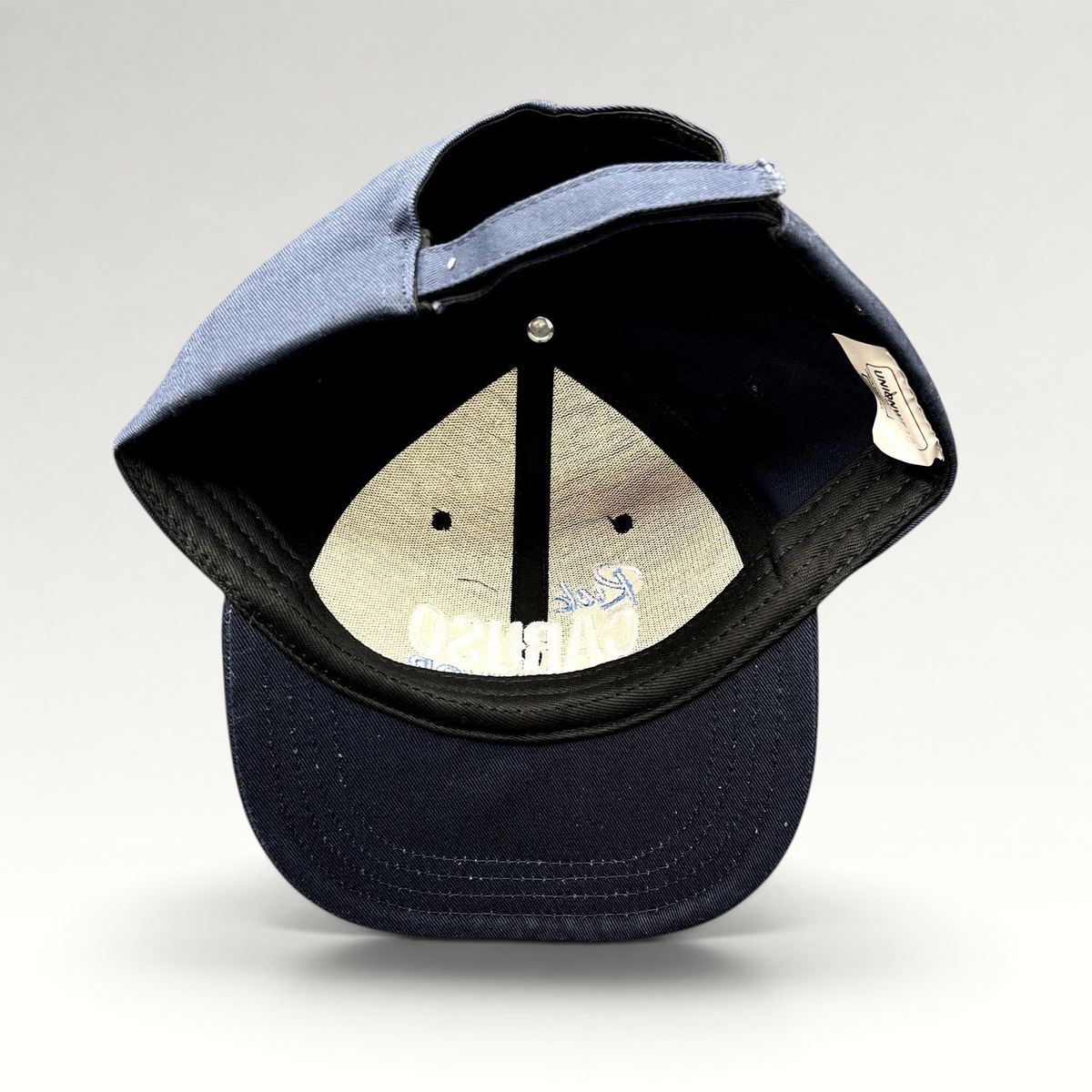 Raree Finds navy blue Rick Caruso for Mayor campaign strapback hat showing interior construction and Unionwear label